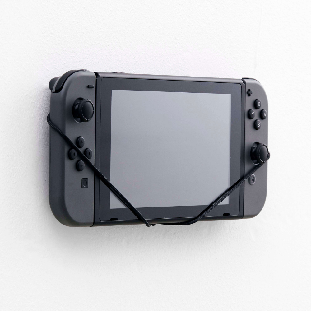 Nintendo Switch Console Wall Mount by FLOATING GRIP