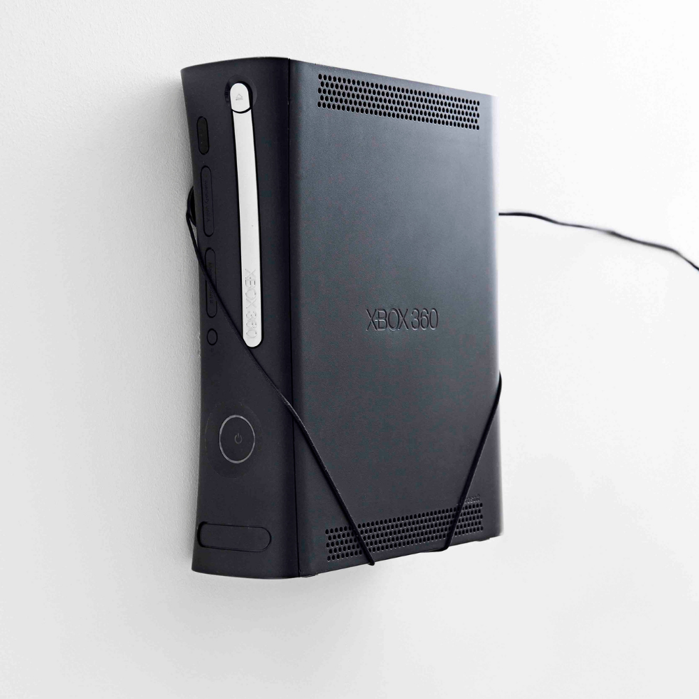 Display XBOX 360 on the wall in the Wall Mount by FLOATING GRIP